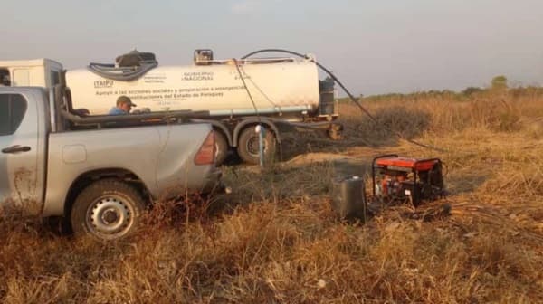 Indígenas enxet reciben agua de tajamar ante crisis hídrica